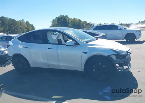 2023 Tesla Model Y Awd/Long Range Dual Motor All-Wheel Drive из США, поврежденный, VIN 7SAYGDEE0PF696254